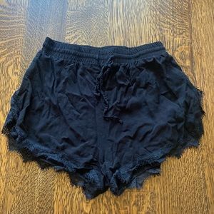 very cute black shorts with lace trim small